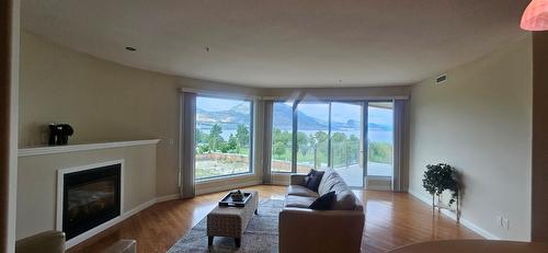 507-250 Marina Way, Penticton, BC - Indoor Photo Showing Living Room With Fireplace