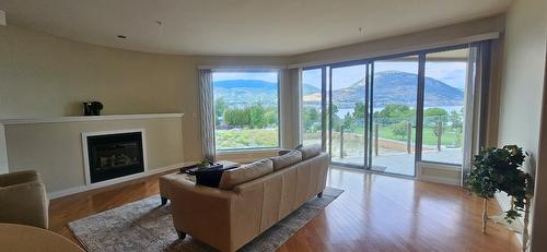 507-250 Marina Way, Penticton, BC - Indoor Photo Showing Living Room With Fireplace