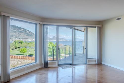 507-250 Marina Way, Penticton, BC - Indoor Photo Showing Other Room With Fireplace