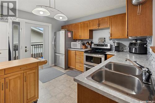 1415 Junor Avenue, Saskatoon, SK - Indoor Photo Showing Kitchen With Double Sink