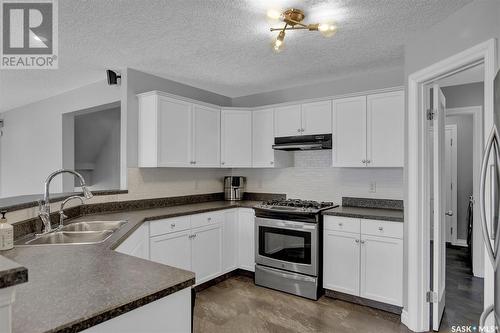 2706 Windsor Park Road, Regina, SK - Indoor Photo Showing Kitchen With Double Sink
