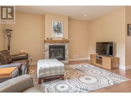 253 Kicking Horse Place, Vernon, BC - Indoor Photo Showing Living Room With Fireplace