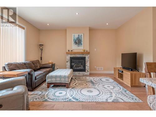 253 Kicking Horse Place, Vernon, BC - Indoor Photo Showing Living Room With Fireplace