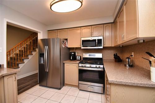 Kitchen with Stainless Steel Appliances - 5235 Thornburn Drive, Burlington, ON - Indoor Photo Showing Kitchen
