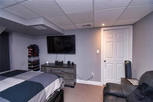 Spacious Lower Rec Room being used as bedroom - 5235 Thornburn Drive, Burlington, ON - Indoor Photo Showing Bedroom