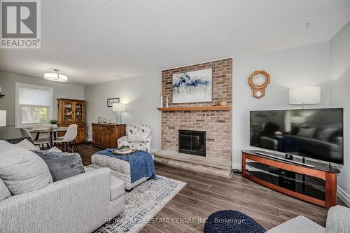 557 Holly Avenue, Milton, ON - Indoor Photo Showing Living Room With Fireplace