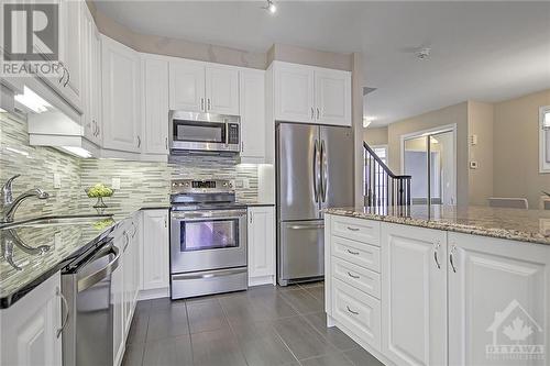24 Sweetbay Circle, Stittsville, ON - Indoor Photo Showing Kitchen With Upgraded Kitchen