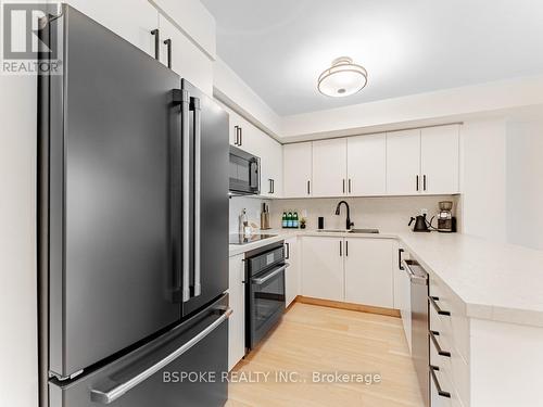 208 - 245 Davisville Avenue, Toronto, ON - Indoor Photo Showing Kitchen With Double Sink