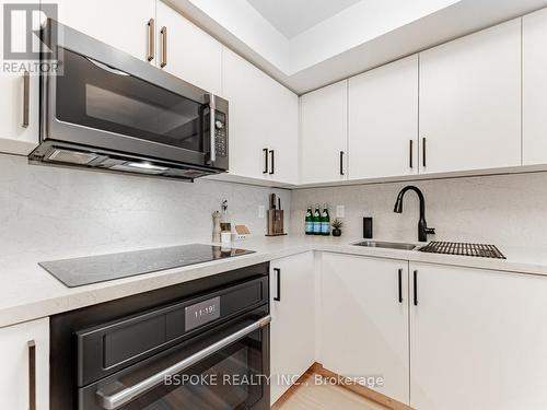 208 - 245 Davisville Avenue, Toronto, ON - Indoor Photo Showing Kitchen With Double Sink With Upgraded Kitchen