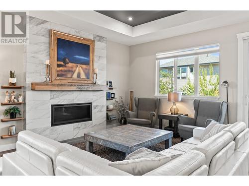 2262 Oglow Drive, Armstrong, BC - Indoor Photo Showing Living Room With Fireplace