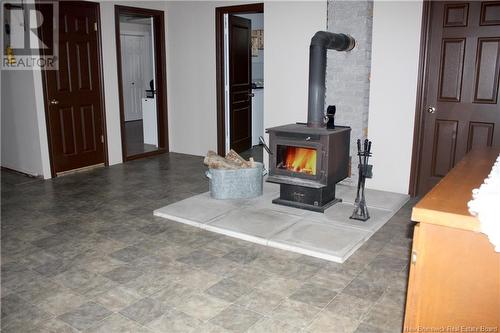 1095 Le Paradis Road, Saint-Jacques, NB - Indoor Photo Showing Other Room With Fireplace