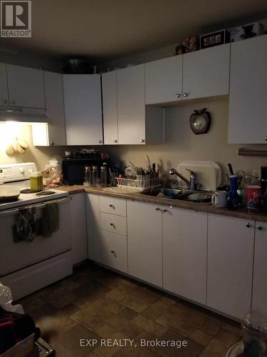 126 Seventh Avenue, Timmins, ON - Indoor Photo Showing Kitchen With Double Sink