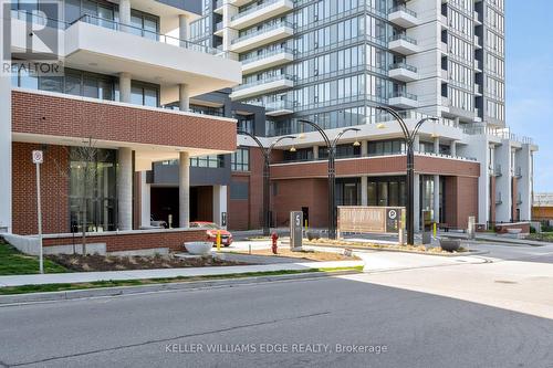 605 - 15 Wellington Street S, Kitchener, ON - Outdoor With Balcony With Facade