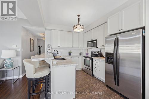 301 - 385 Lakebreeze Drive, Clarington, ON - Indoor Photo Showing Kitchen With Double Sink