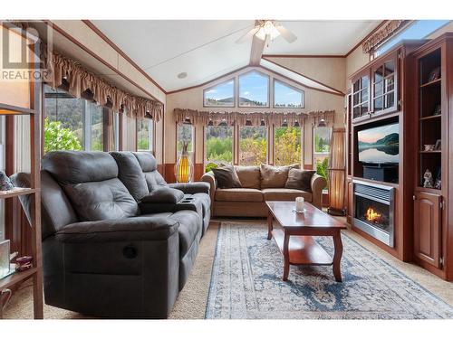 4354 Highway 3 Unit# 73, Keremeos, BC - Indoor Photo Showing Living Room With Fireplace
