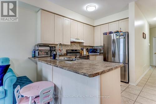 385 Murray Ross Parkway N, Toronto, ON - Indoor Photo Showing Kitchen With Double Sink