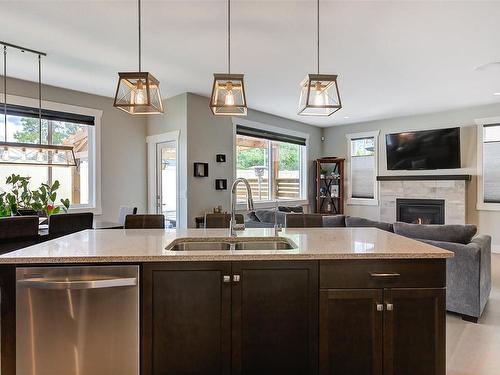 3112 Riesling Way, West Kelowna, BC - Indoor Photo Showing Kitchen With Fireplace With Double Sink