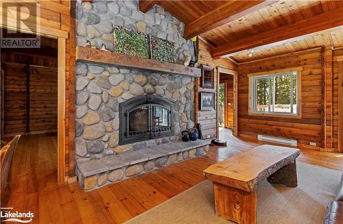 215 Crane Lake Water, The Archipelago, ON - Indoor Photo Showing Living Room With Fireplace