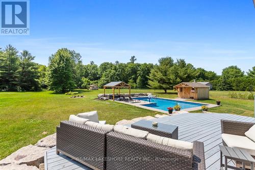 9451 Hutsell Road, Hamilton Township (Baltimore), ON - Outdoor With In Ground Pool With Deck Patio Veranda