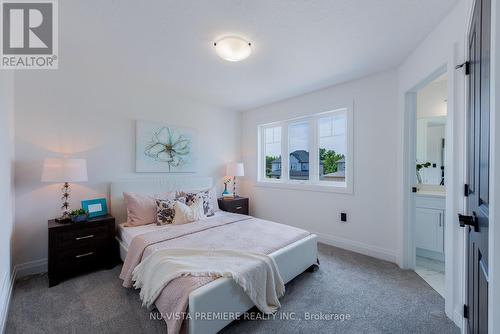 28 Basil Crescent, Middlesex Centre (Ilderton), ON - Indoor Photo Showing Bedroom