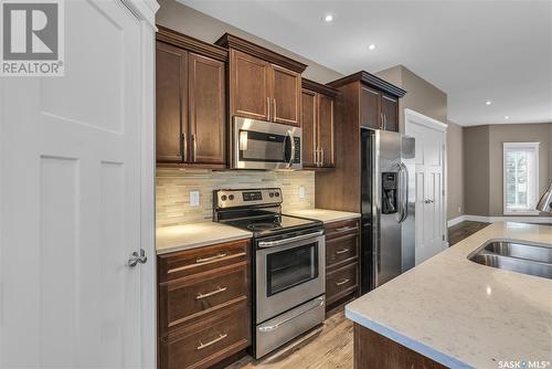 111A 108Th Street W, Saskatoon, SK - Indoor Photo Showing Kitchen With Double Sink