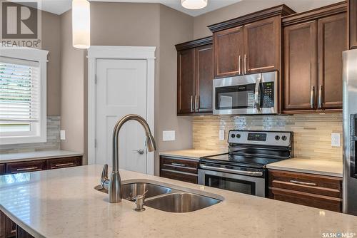 111A 108Th Street W, Saskatoon, SK - Indoor Photo Showing Kitchen With Double Sink With Upgraded Kitchen