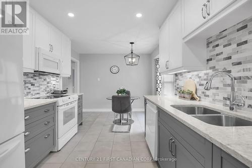 75 - 50 Fiddlers Green Road, London, ON - Indoor Photo Showing Kitchen With Double Sink