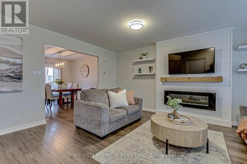 24 - 335 Lighthouse Road, London, ON - Indoor Photo Showing Living Room With Fireplace