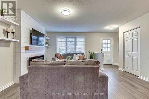 24 - 335 Lighthouse Road, London, ON - Indoor Photo Showing Living Room With Fireplace