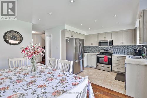 129 - 7360 Zinnia Place E, Mississauga, ON - Indoor Photo Showing Kitchen With Double Sink