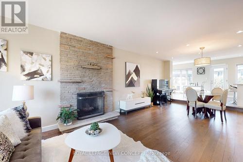 24 Fleetwell Court, Toronto, ON - Indoor Photo Showing Living Room With Fireplace