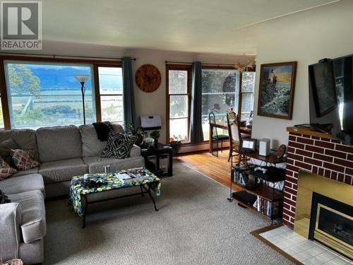 604 Ibbitson  Street, Creston, BC - Indoor Photo Showing Living Room With Fireplace