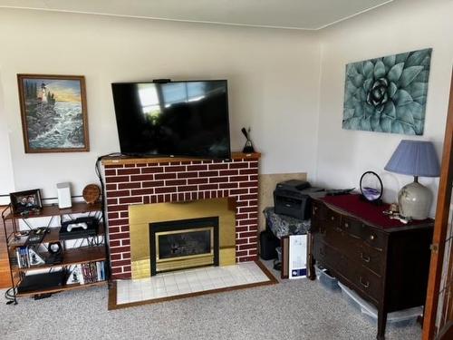 604 Ibbitson Street, Creston, BC - Indoor Photo Showing Other Room With Fireplace