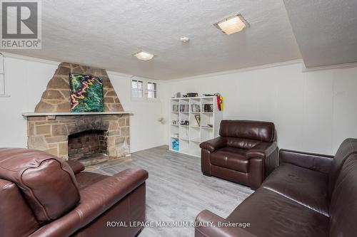 378 Prince Edward Drive N, Toronto, ON - Indoor Photo Showing Living Room With Fireplace