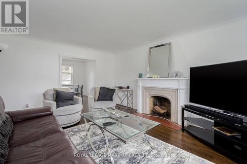 378 Prince Edward Drive N, Toronto, ON - Indoor Photo Showing Living Room With Fireplace