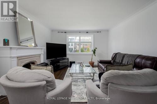 378 Prince Edward Drive N, Toronto, ON - Indoor Photo Showing Living Room With Fireplace