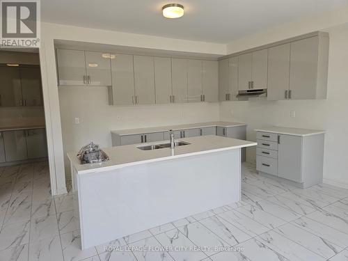 10 Hummingbird Grove, Adjala-Tosorontio (Colgan), ON - Indoor Photo Showing Kitchen With Double Sink