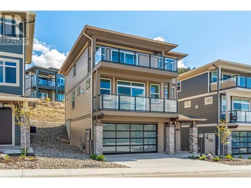 1473 Tower Ranch Drive, Kelowna, BC - Outdoor With Balcony With Facade