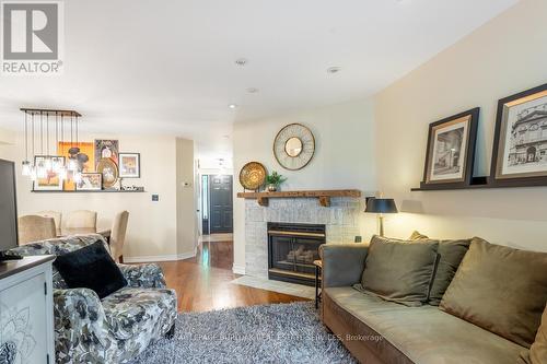 14 - 2230 Walker'S Line, Burlington, ON - Indoor Photo Showing Living Room With Fireplace