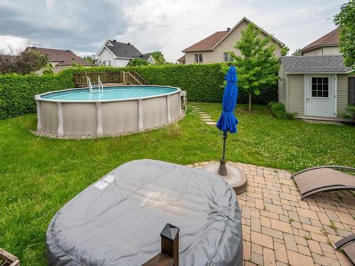 Cour - 745 Rue Wilfrid-Pelletier, Boucherville, QC - Outdoor With Above Ground Pool With Backyard