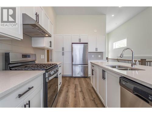 1408 Tower Ranch Drive, Kelowna, BC - Indoor Photo Showing Kitchen With Double Sink With Upgraded Kitchen