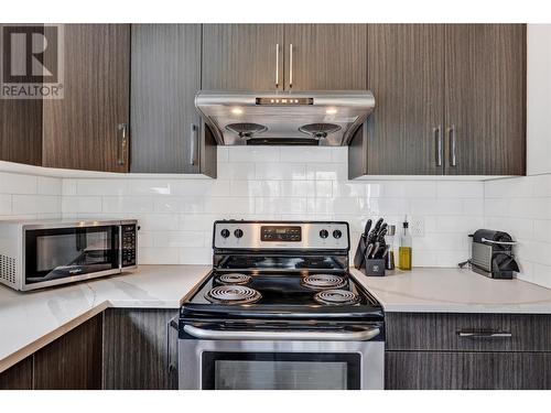 1130 Stockley Street, Kelowna, BC - Indoor Photo Showing Kitchen With Stainless Steel Kitchen With Upgraded Kitchen