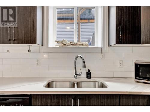 1130 Stockley Street, Kelowna, BC - Indoor Photo Showing Kitchen With Double Sink