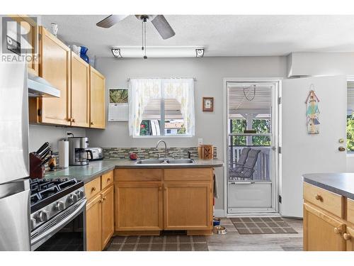 605 Girard Road, Kelowna, BC - Indoor Photo Showing Kitchen With Double Sink