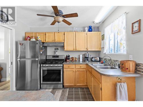 605 Girard Road, Kelowna, BC - Indoor Photo Showing Kitchen With Double Sink