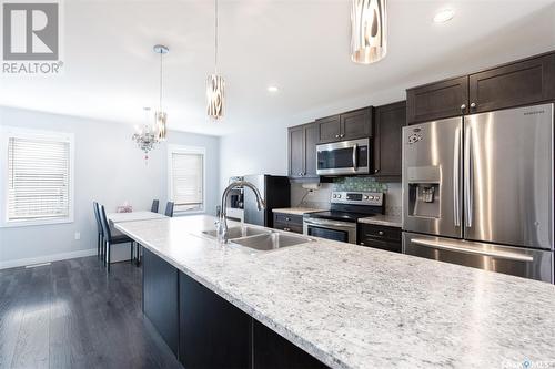 63 Brigham Road, Moose Jaw, SK - Indoor Photo Showing Kitchen With Double Sink With Upgraded Kitchen