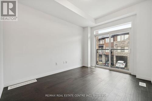 296 - 30 Times Square Boulevard, Hamilton (Stoney Creek Mountain), ON - Indoor Photo Showing Other Room With Fireplace