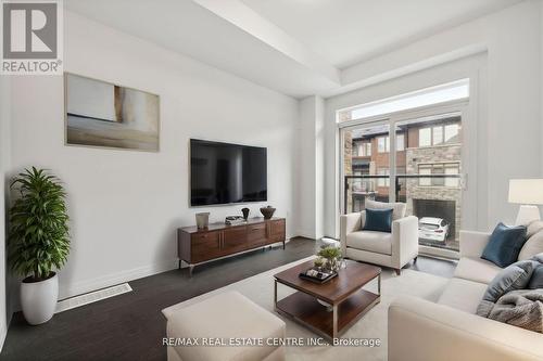 296 - 30 Times Square Boulevard, Hamilton (Stoney Creek Mountain), ON - Indoor Photo Showing Living Room