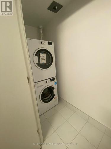 207 - 26 Gibbs Road, Toronto, ON - Indoor Photo Showing Laundry Room