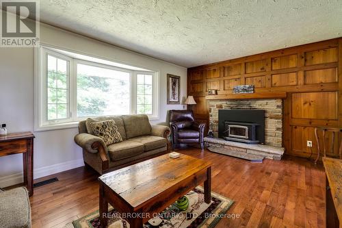 7718 22 Sideroad, Halton Hills, ON - Indoor Photo Showing Living Room With Fireplace